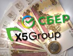 Сбер и X5 Group запустили сервис снятия наличных на кассах