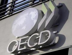 ОЭСР прогнозирует ограниченный рост из-за повышения процентных ставок