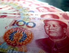 Глобальные инвестиционные банки стремительно понижают свои прогнозы по курсу китайского юаня