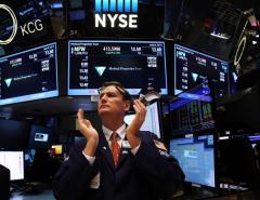 Материнская компания NYSE превзошла оценки по прибыли благодаря высоким объемам торгов